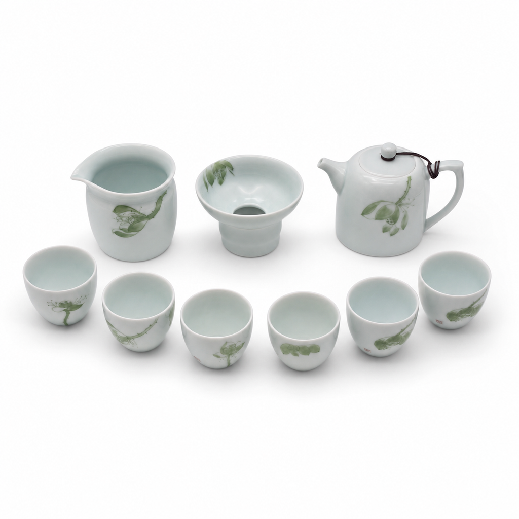 Nine-piece celadon tea set, elevated white studio view