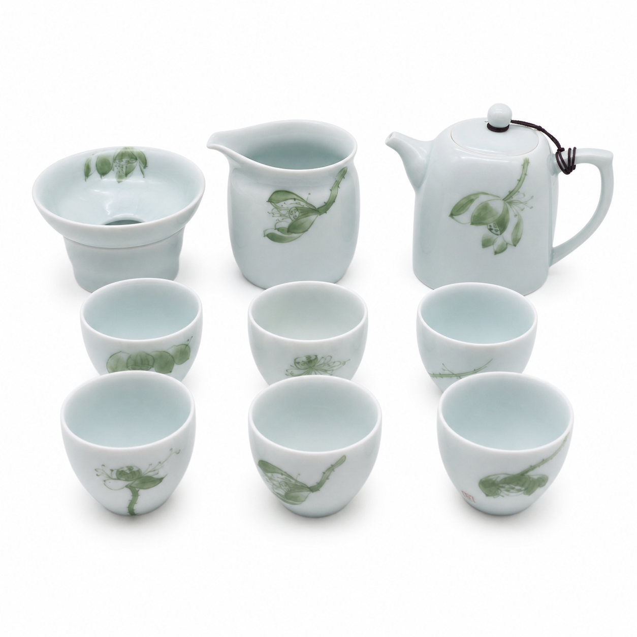 Nine-piece celadon tea set, front white studio view
