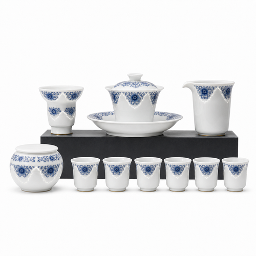 White studio view with black riser for Linglong porcelain gaiwan tea set