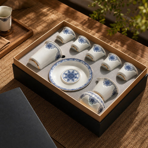 Blue-and-white Linglong porcelain tea set arranged in a black gift box